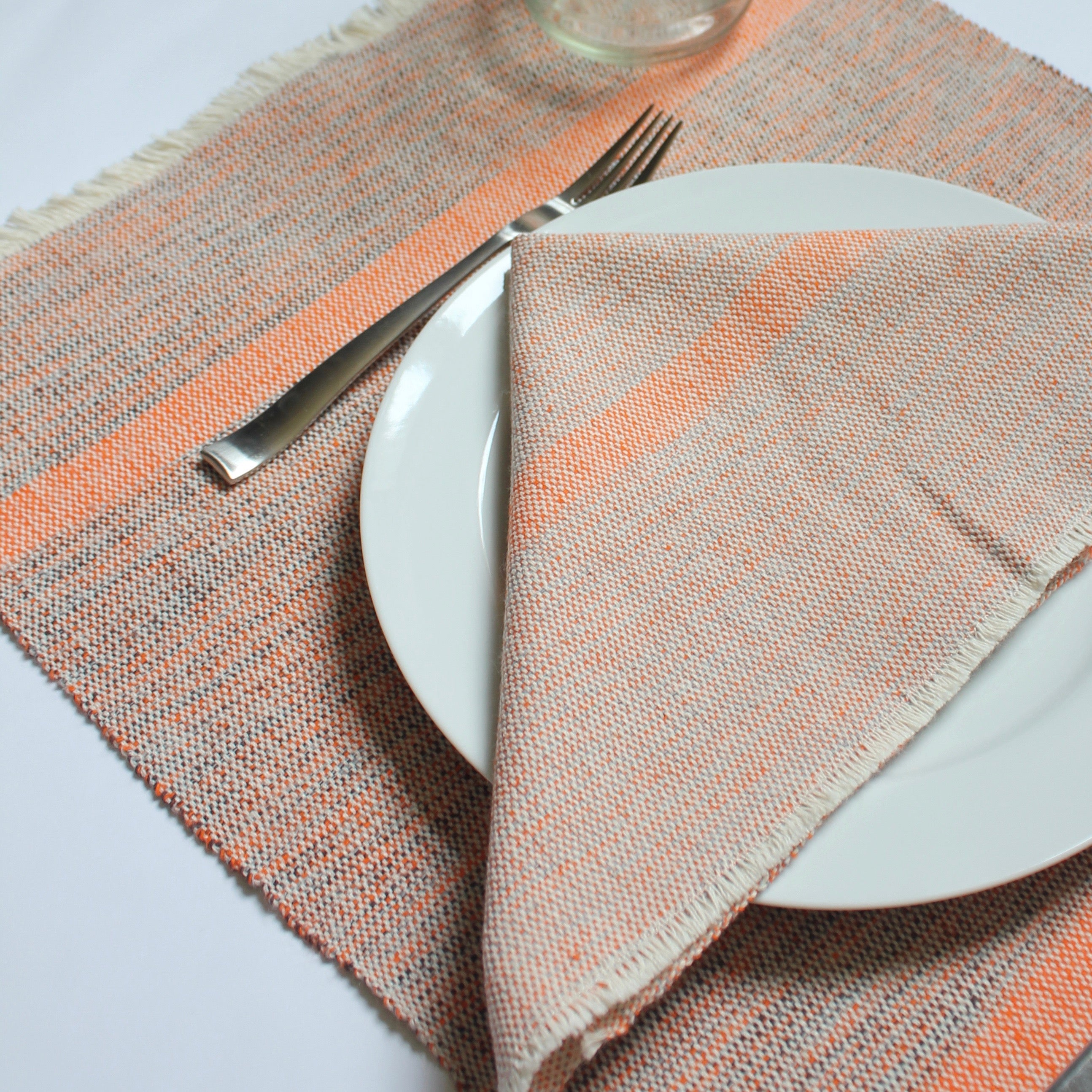 INDI placemats hand woven by Living Threads Co. partner artisans