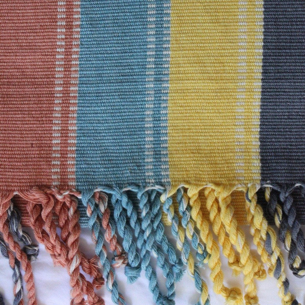 Handmade organic cotton blanket / throw naturally dyed and handwoven on backstop loom in Guatemala by Living Threads Co. artisans