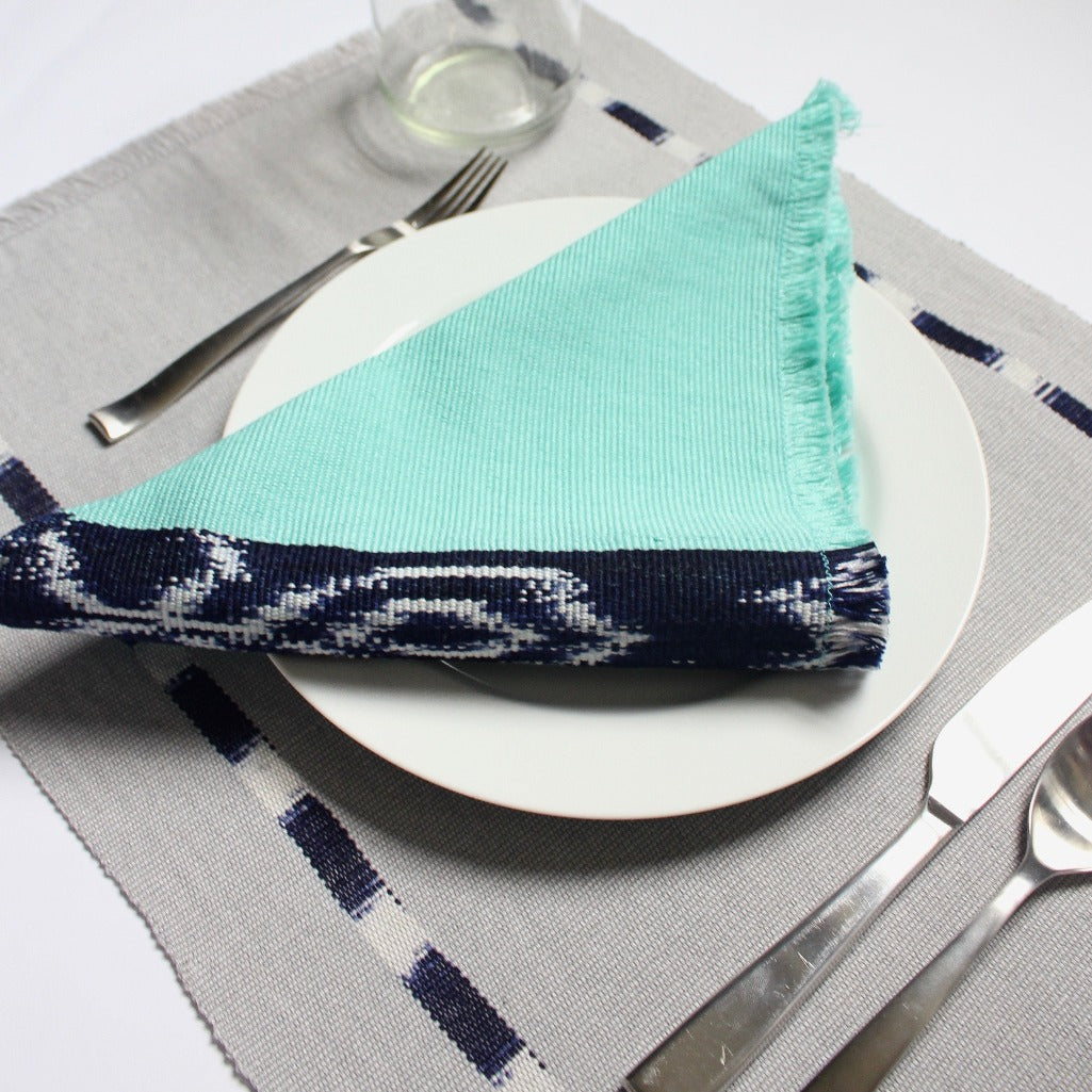 Grey KAT placemats handwoven on mayan backstrap looms in Guatemala by Living Threads Co. artisans.