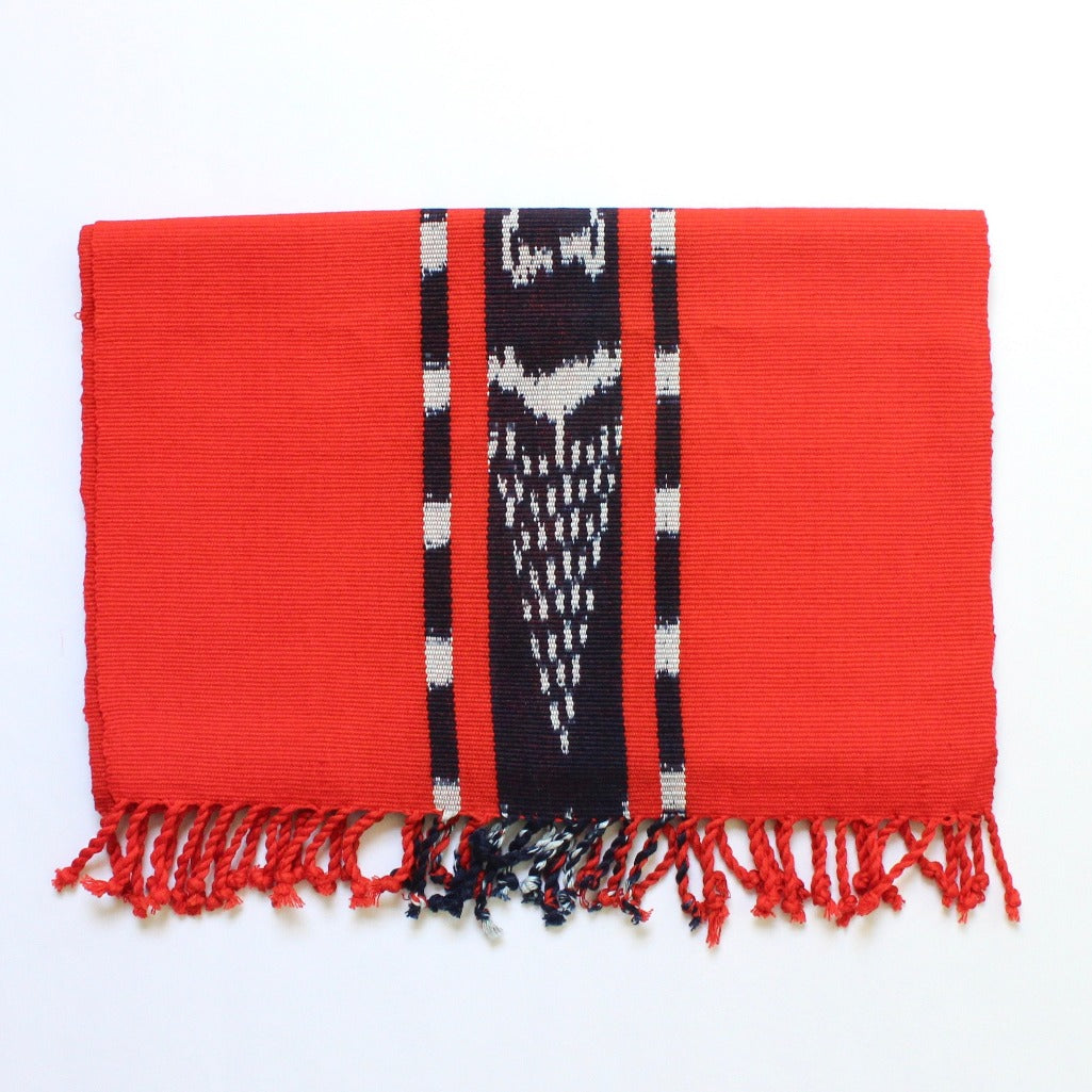 Bright orange Achiote TAY Ikat Natural Dy etable runner handwoven on Mayan backstrap loom by Living Threads Co. skilled artisans in Guatemala.