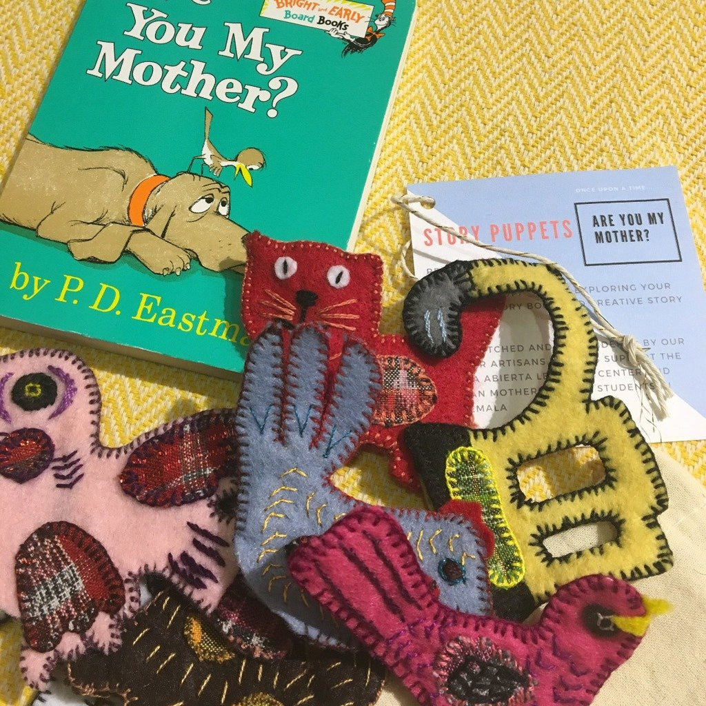 Animal puppet set based on children's book Are You My Mother, made with recycled fabric by Living Threads Co. artisans and mothers.