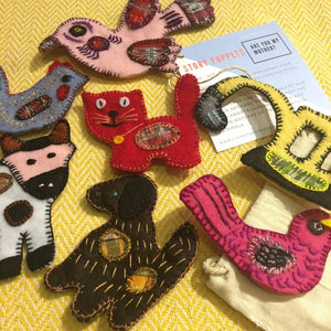 Living Threads Co. animal puppet set based on children's book Are You My Mother, made with recycled fabric by artisans and mothers in Guatemala.