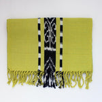 Handwoven Chartreuse table runner with Ikat design woven and naturally dyed by Living Threads Co. partner artisans in Guatemala.