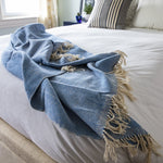 Handcrafted artisanal throw blanket by Living Threads Co. artisans in royal blue cotton