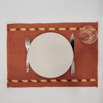 Living Threads Co. set of 4 brown naturally dyed cotton cloth placemats handmade by artisans in Guatemala on traditional Mayan backstrap looms.