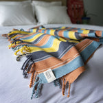 Naturally dyed eco cotton handcrafted throw blanket by Living Threads Co. artisans in Guatemala