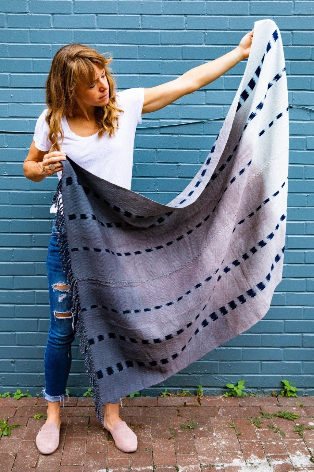 Handwoven DIPI blanket/throw made by female artisans in Guatemala with 100% naturally dyed grey cotton in Guatemala.