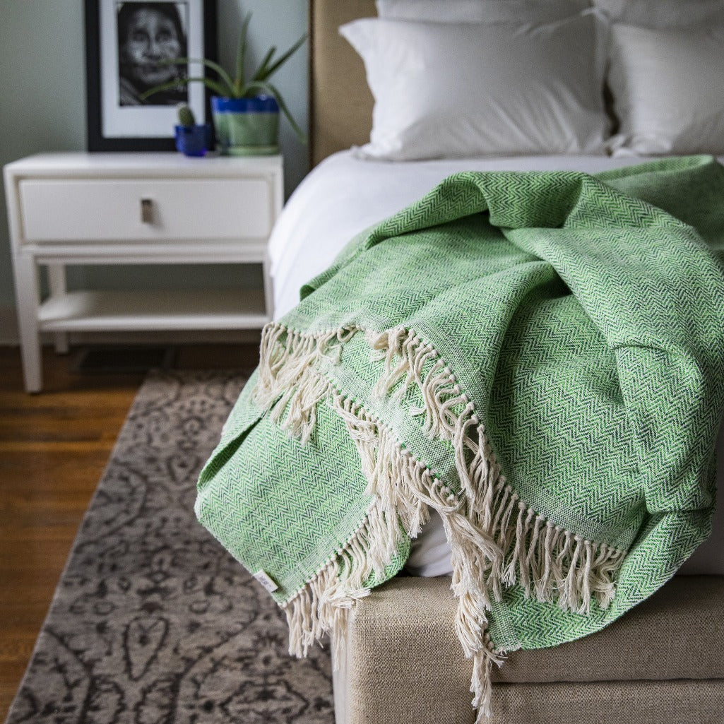 Handwoven cotton ecologically dyed MADERA blanket and throw in Emerald by Living Threads Co. artisans in Nicaragua.