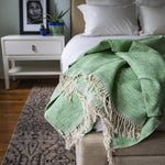 Handwoven cotton ecologically dyed MADERA blanket and throw in Emerald by Living Threads Co. artisans in Nicaragua.
