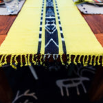 Living Threads Co. Chartreuse Ikat naturally dyed TAY table runner handwoven by Guatemalan artisans.