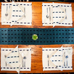 Naturally dyed handwoven cotton Ikat placemats made by Living Threads Co. Guatemalan artisans.