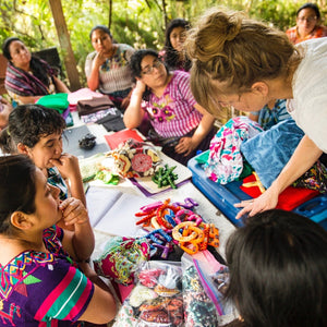 Living Threads Co. partner artisans in Guatemala working on our alphabet and number sets