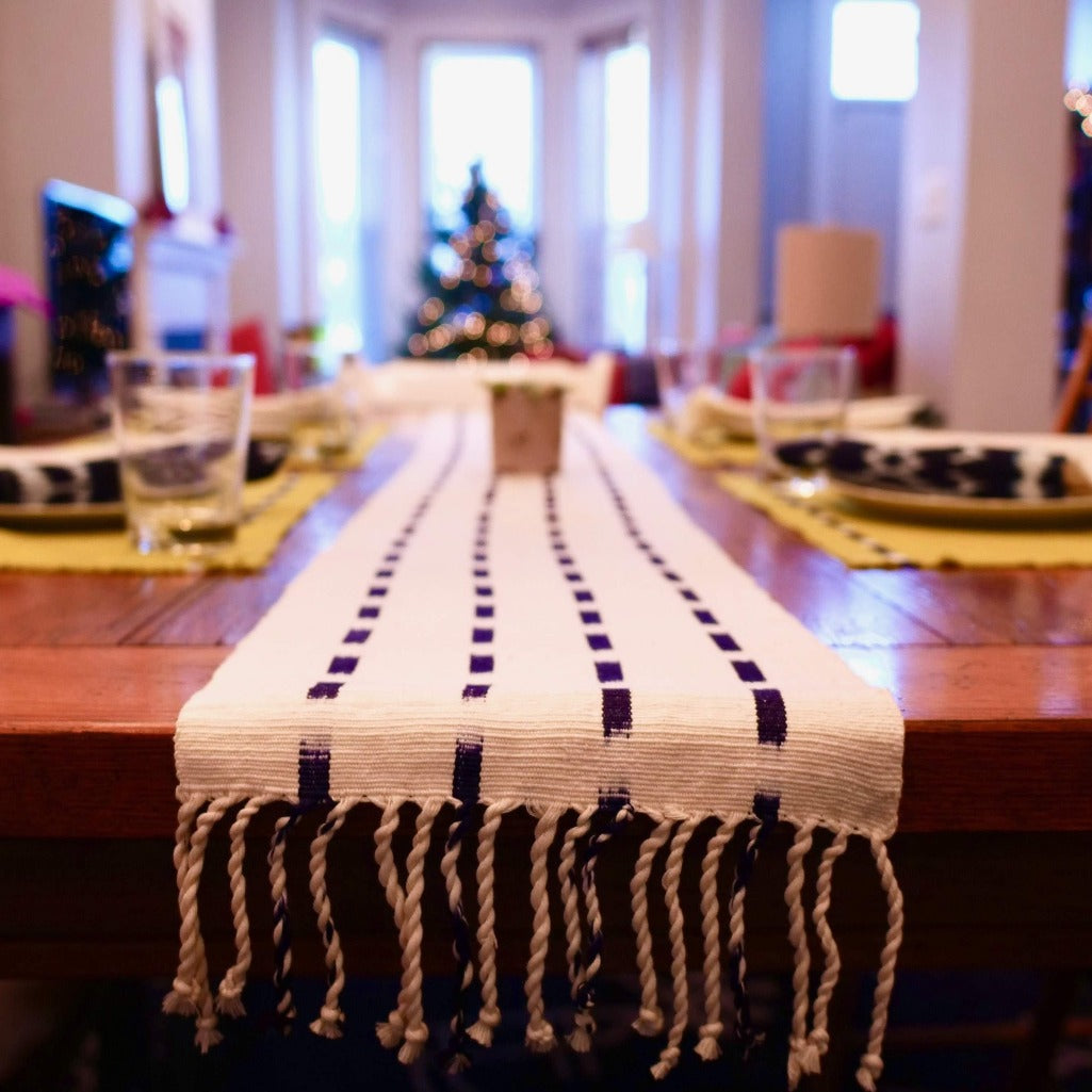 Living Threads Co. Natural TIPICA table runner in naturally dyed cotton, handwoven by partner artisans in Guatemala. 
