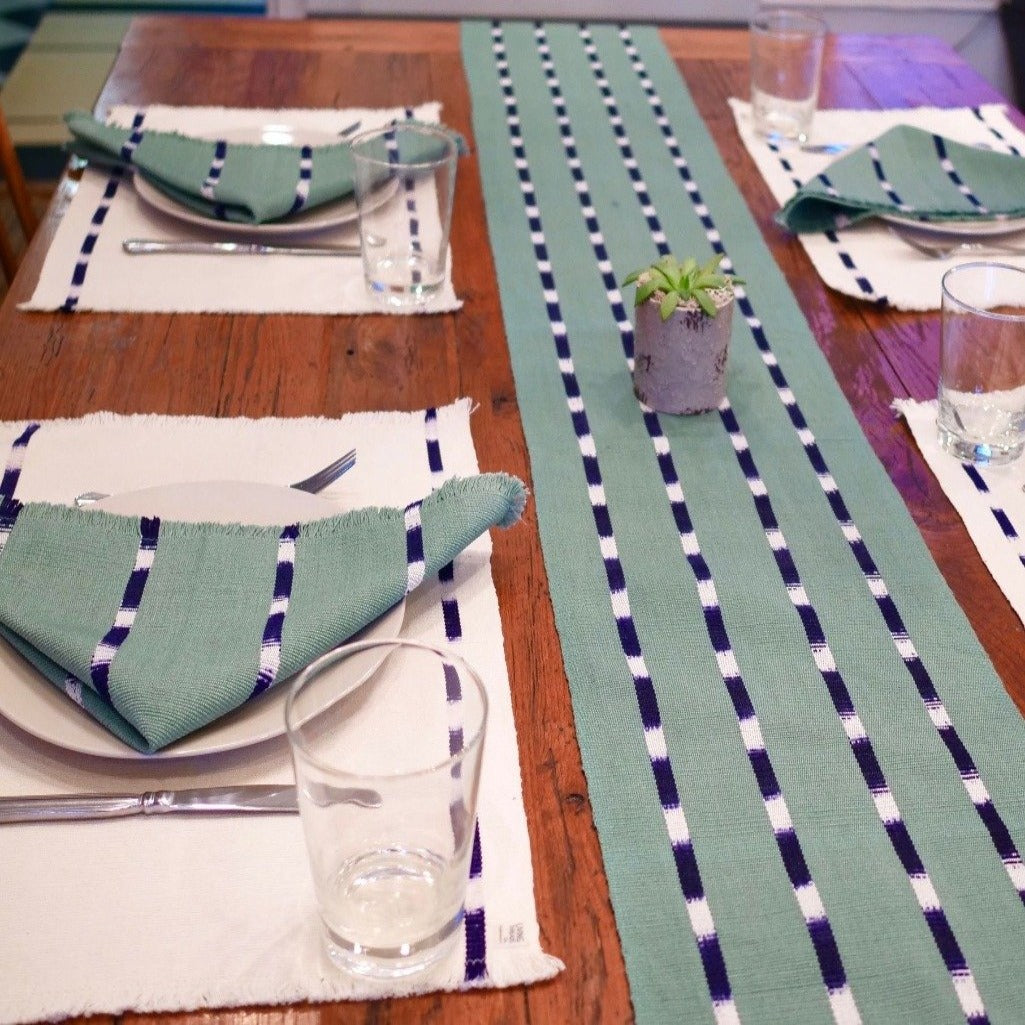 TIPICA table runner in Forest, hand crafted and naturally dyed by Living Threads Co. partner artisans in Guatemala.