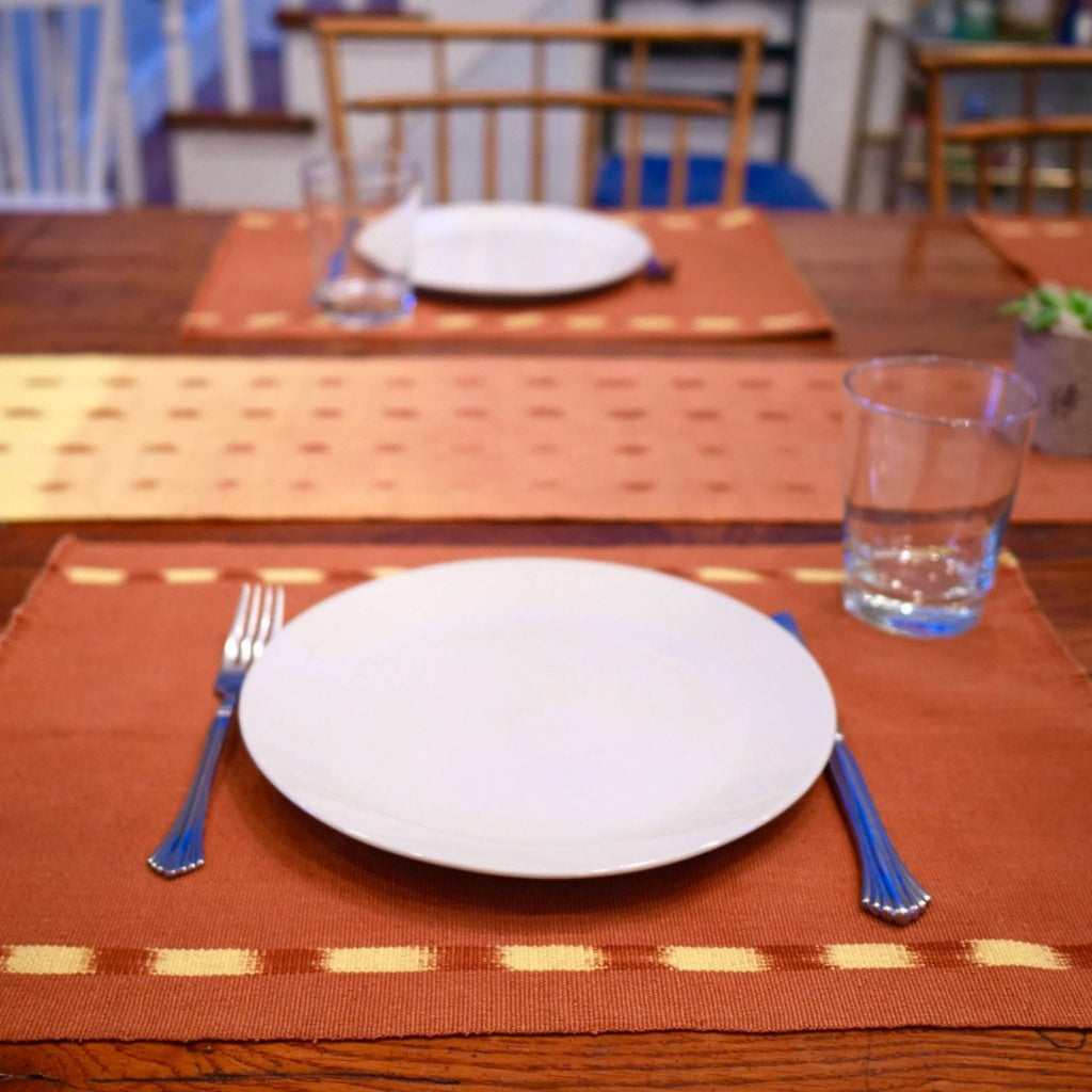 Brown KAT placemats handwoven by skilled artisans in Guatemala.