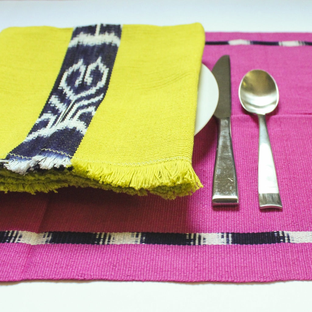 KAT placemats handwoven on mayan backstrap looms in Guatemala by Living Threads Co. artisans in Pink Ikat