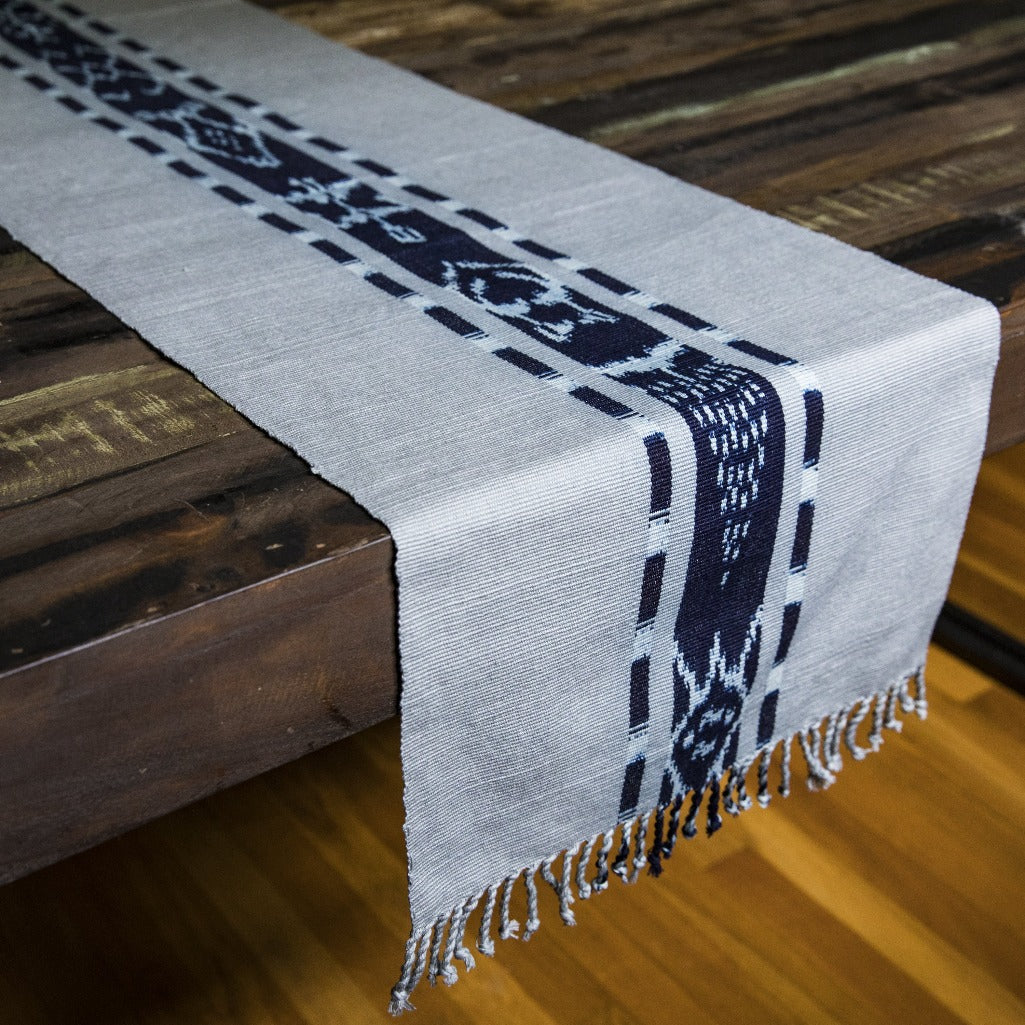 TAY table runner hand woven in Guatemala on Mayan backstrap loom and naturally dyed by Living Threads Co. skilled artisans in Grey