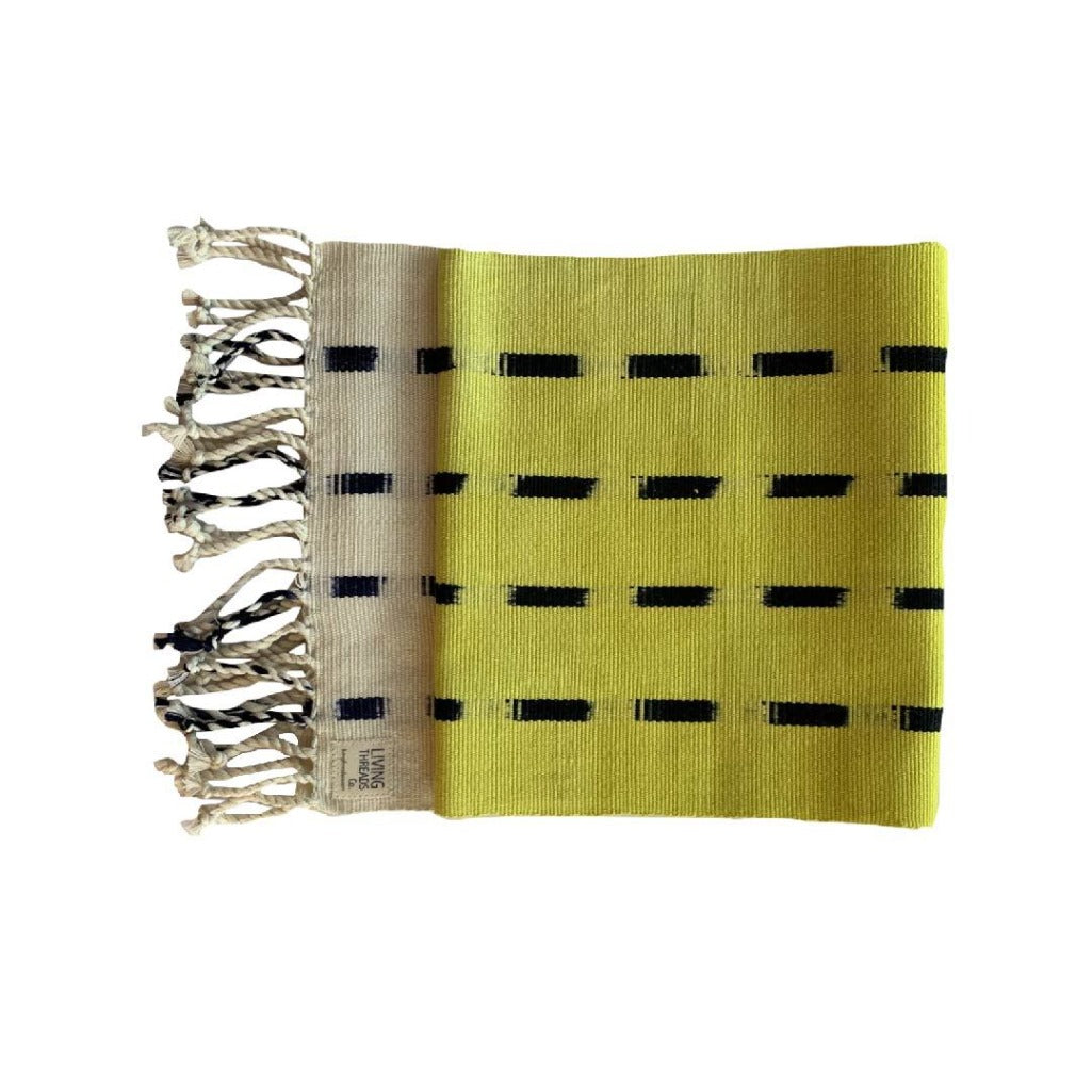 Handcrafted dip dye throw by Living Threads Co. artisans in Guatemala in chartreuse