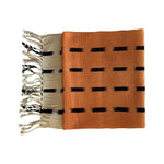 Naturally dyed rust orange blanket/throw in 100% handwoven cotton by female Guatemalan artisans with Living Threads Co. 
