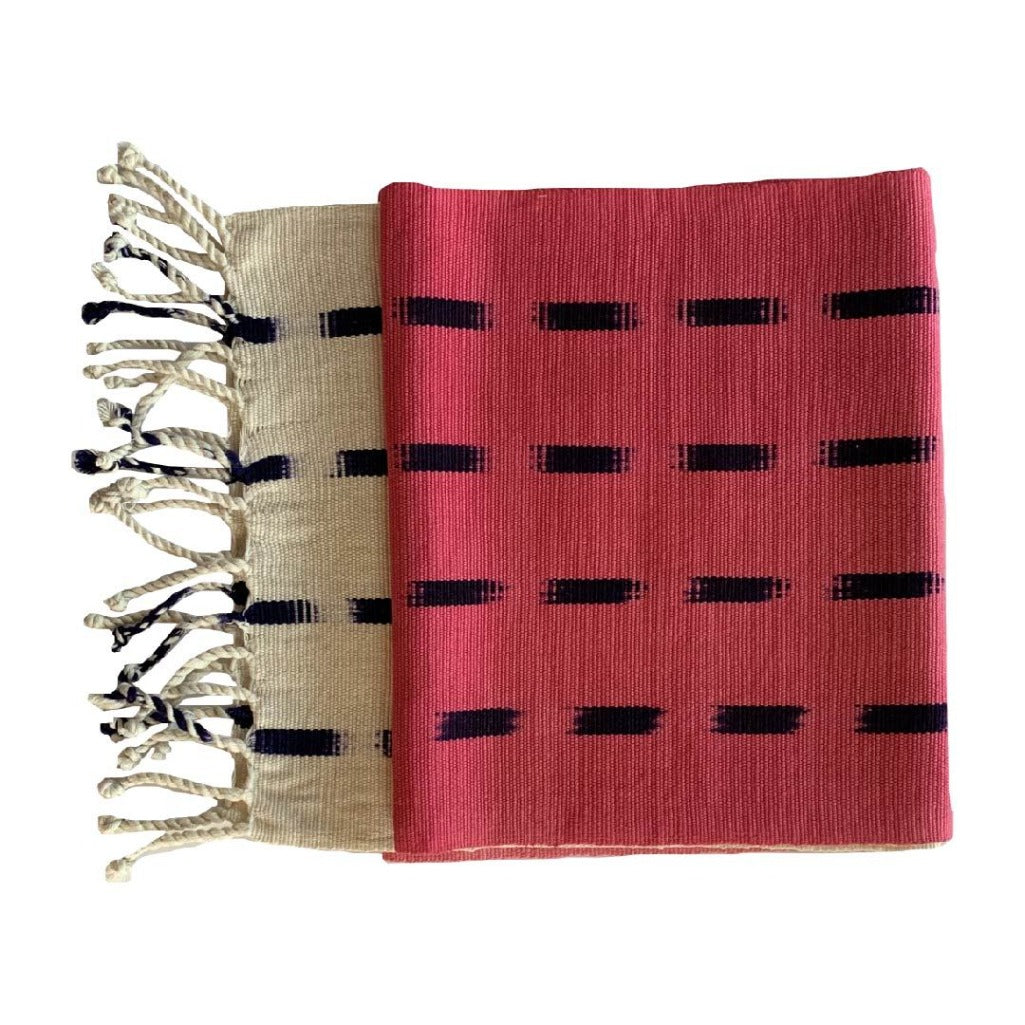 Handcrafted dip dye throw by Living Threads Co. artisans in Guatemala in pink